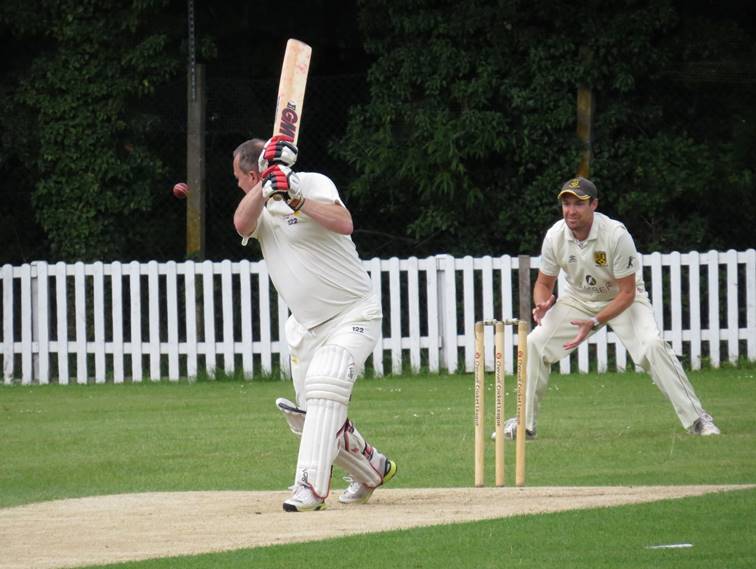 A picture containing grass, sport, outdoor, cricket

Description automatically generated