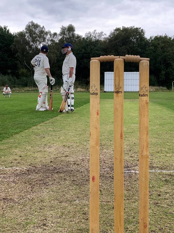 A group of men playing cricket

Description automatically generated with low confidence