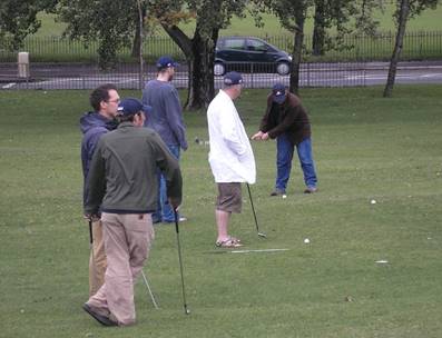 A group of people playing golf

Description automatically generated with low confidence