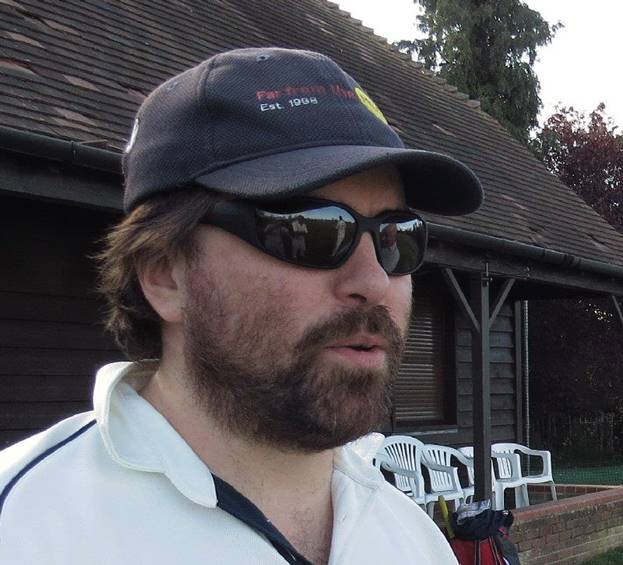 A person wearing sunglasses and a hat

Description automatically generated with medium confidence